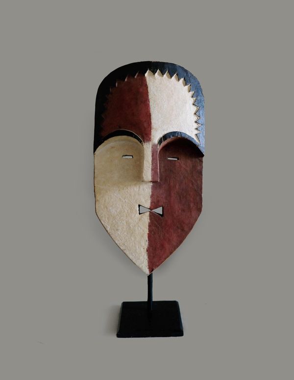 Hand painted mask object on stand, Africa